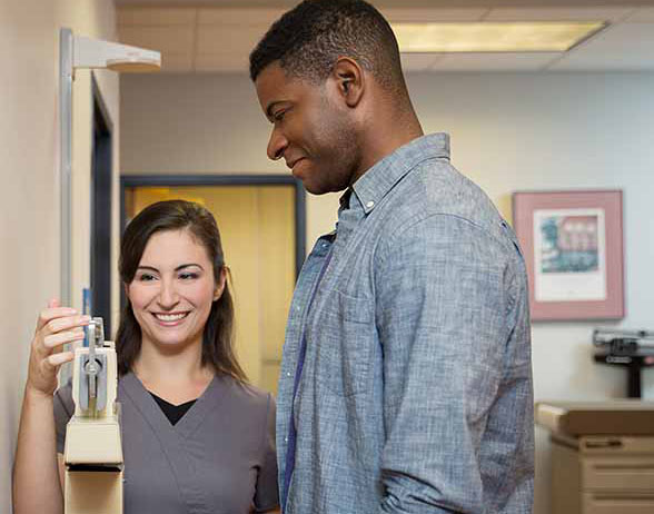 medical-administrative-assistant-with-clipboard medical-administrative-assistant-with-clipboard